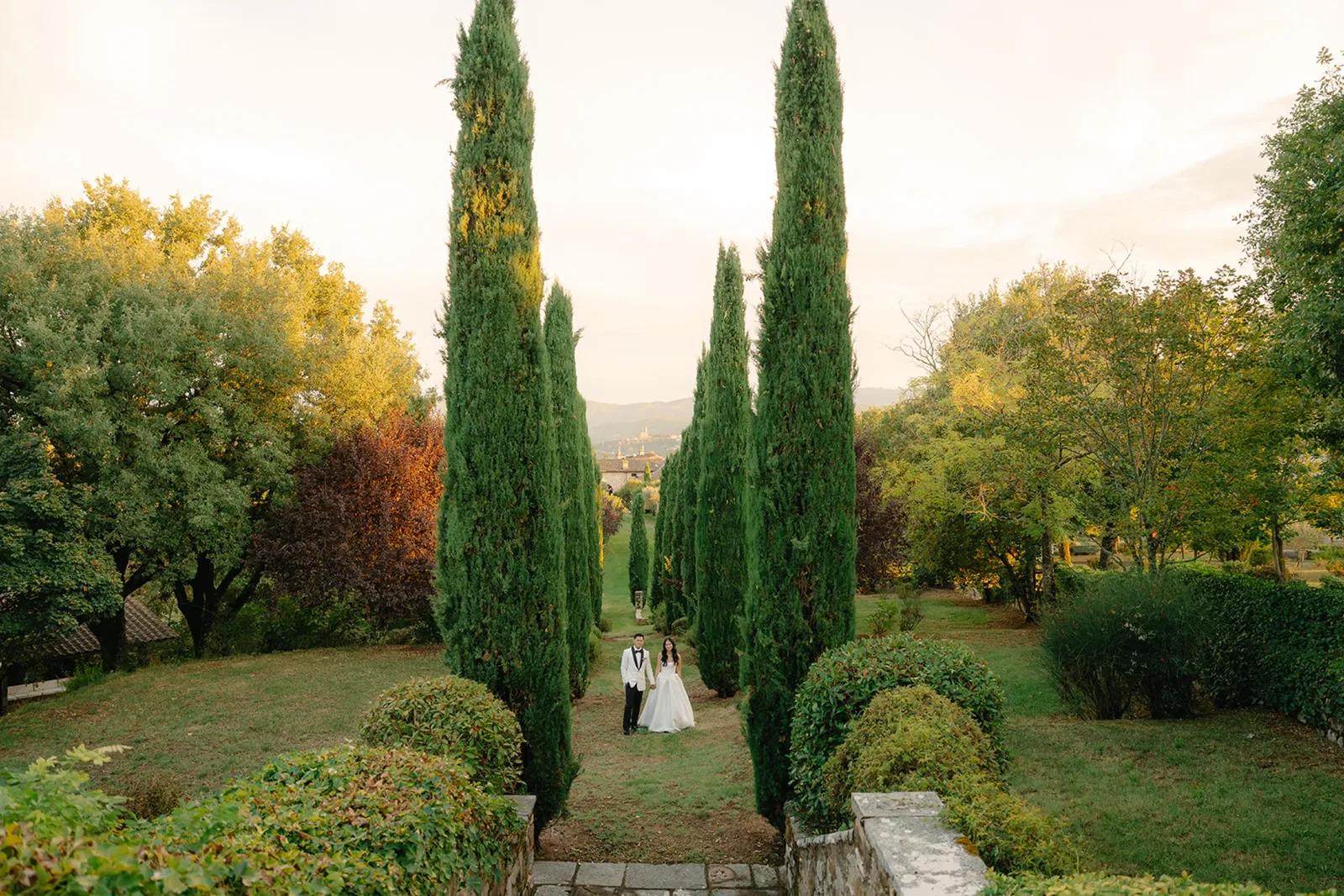 Borgo Corsignano Couple Between The Cypress Trees